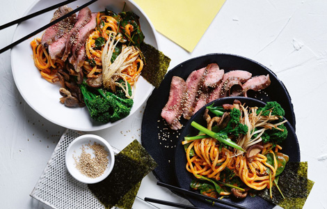 Ginger Express Asian-style noodle stir-fry topped with sliced medium-rare steak in Leith. 
